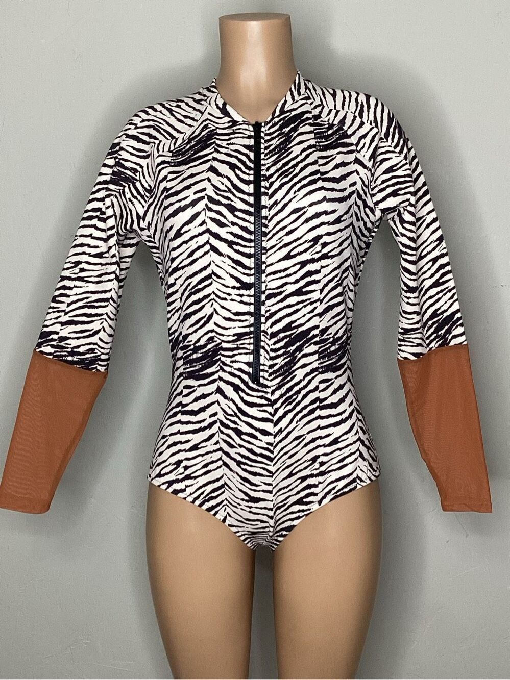 New. WET brown zebra surf suit. Retails $198